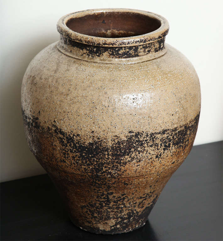 Beautiful Kame, wide mouth jar made of Shigaraki ware has markings from the coat of ash and minerals when fired in an ancient kiln.