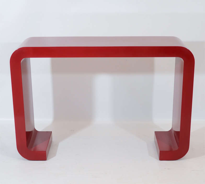 Asian inspired, modern red lacquered console table.  Located at ABC Home 646-602-3519.