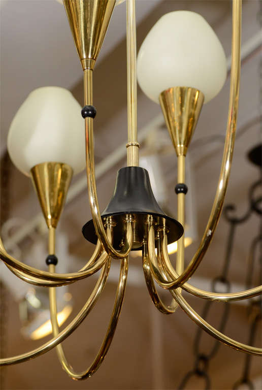Mid Century Brass Nine Light Chandelier with Frosted Shades In Good Condition In New York, NY