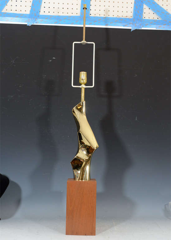 A pair of great form of Abstract Gold tone Metal sculptural lamps with a Beautiful tall wooden block base and Great Enameled Modernist Harps and Brass Finials.
 
