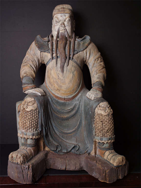 This large but not to grandly scaled carved wood and polychromed figure of a court official has a powerful presences exactly what it was meant to convey Used by Ching dynasty officials as objects of instruction and veneration statuary representing
