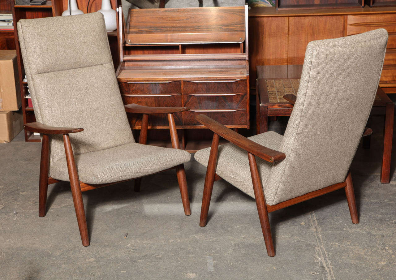 Vintage 1950s Danish Armchairs by Hans Wegner.

This pair of Midcentury Designer Chairs (including the fabric) are in like-new condition.  The kind of comfort only Hans Wegner could offer. Ready for pick up, delivery, or shipping.