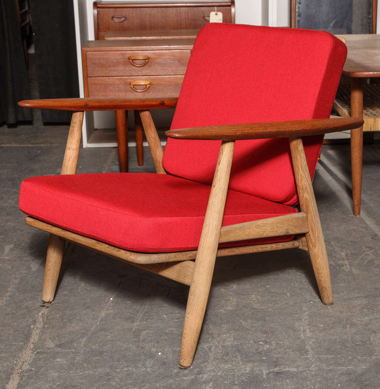 Vintage 1950s Getama Cigar Chair by Hans Wegner.

This Vintage Wegner Chair has it's original spring cushions which are incredibly comfort. Seriously only comparable to a cloud. The Arms are made of teak and base of oak, a very popular combination