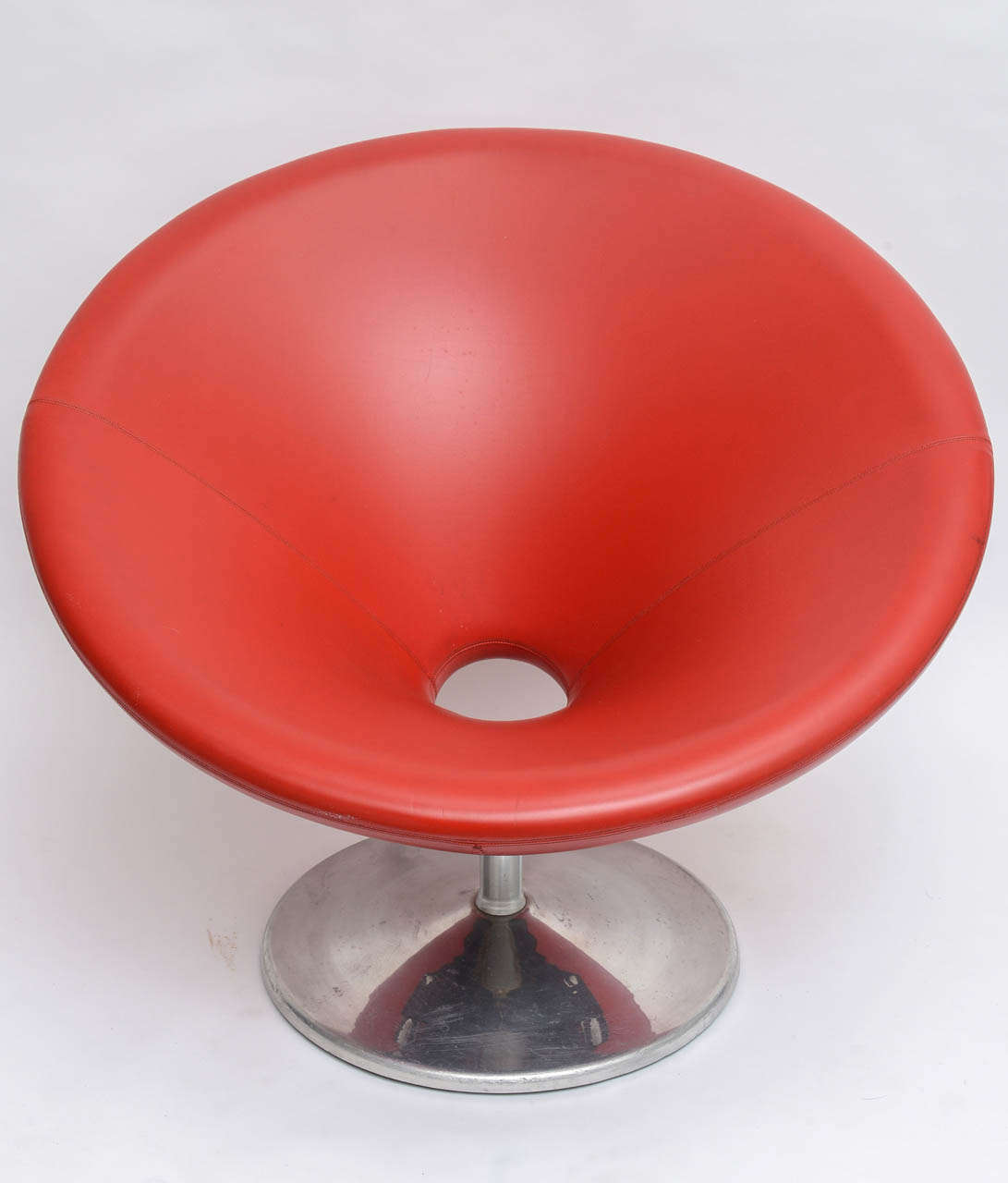 Vintage 1970's red chair on aluminum base. Very sculptural and very comfortable!