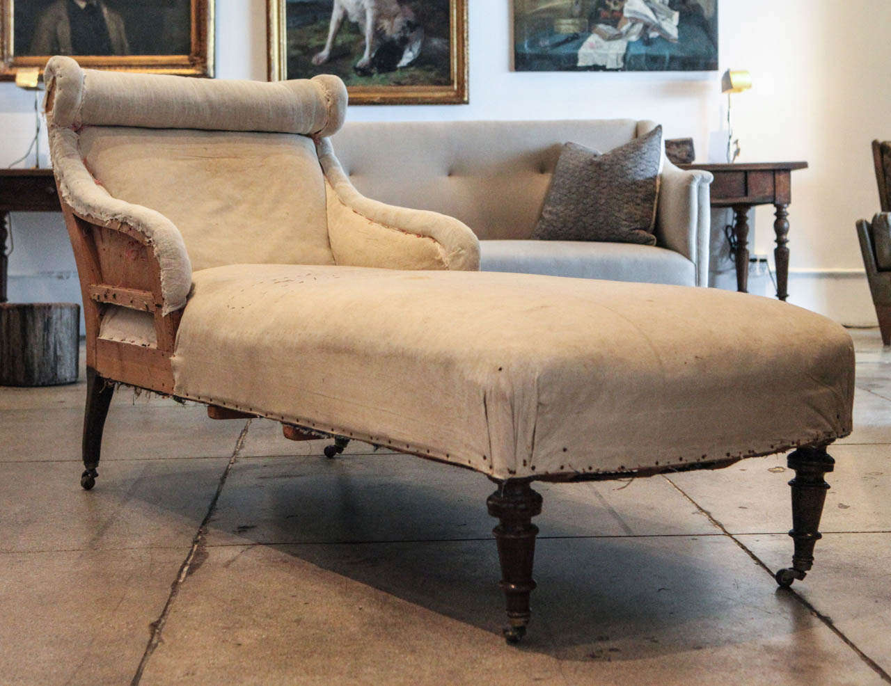 A beautifully curved Swedish chaise in its original upholstered muslin.