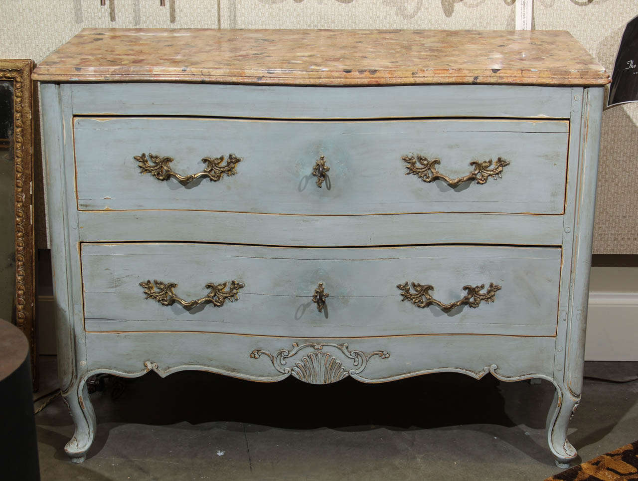 A vintage two drawer Louis XV style painted chest with marbleized top and distressed painted and beeswax finish