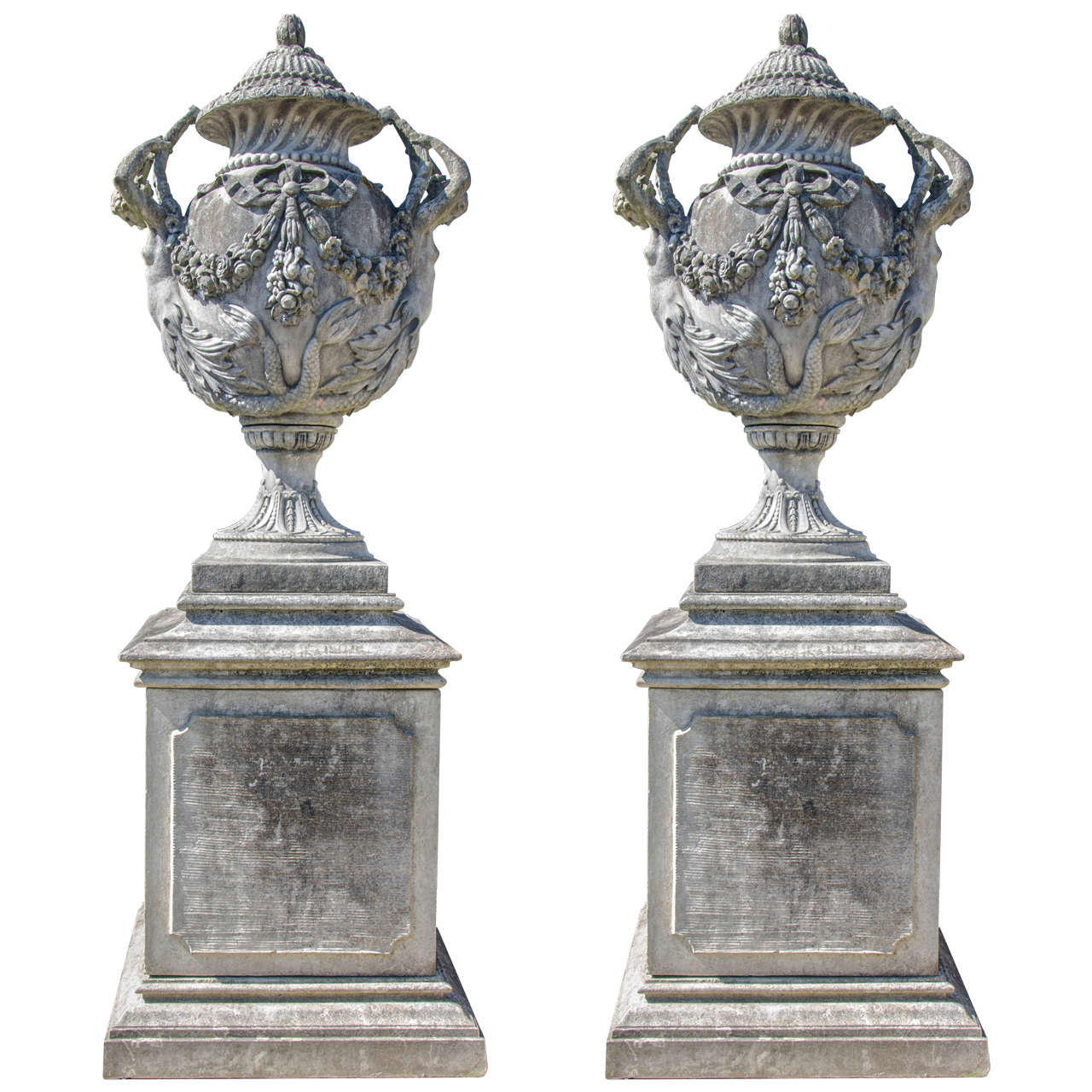 Pair of Large Ornate Stone Urns on Plinths For Sale