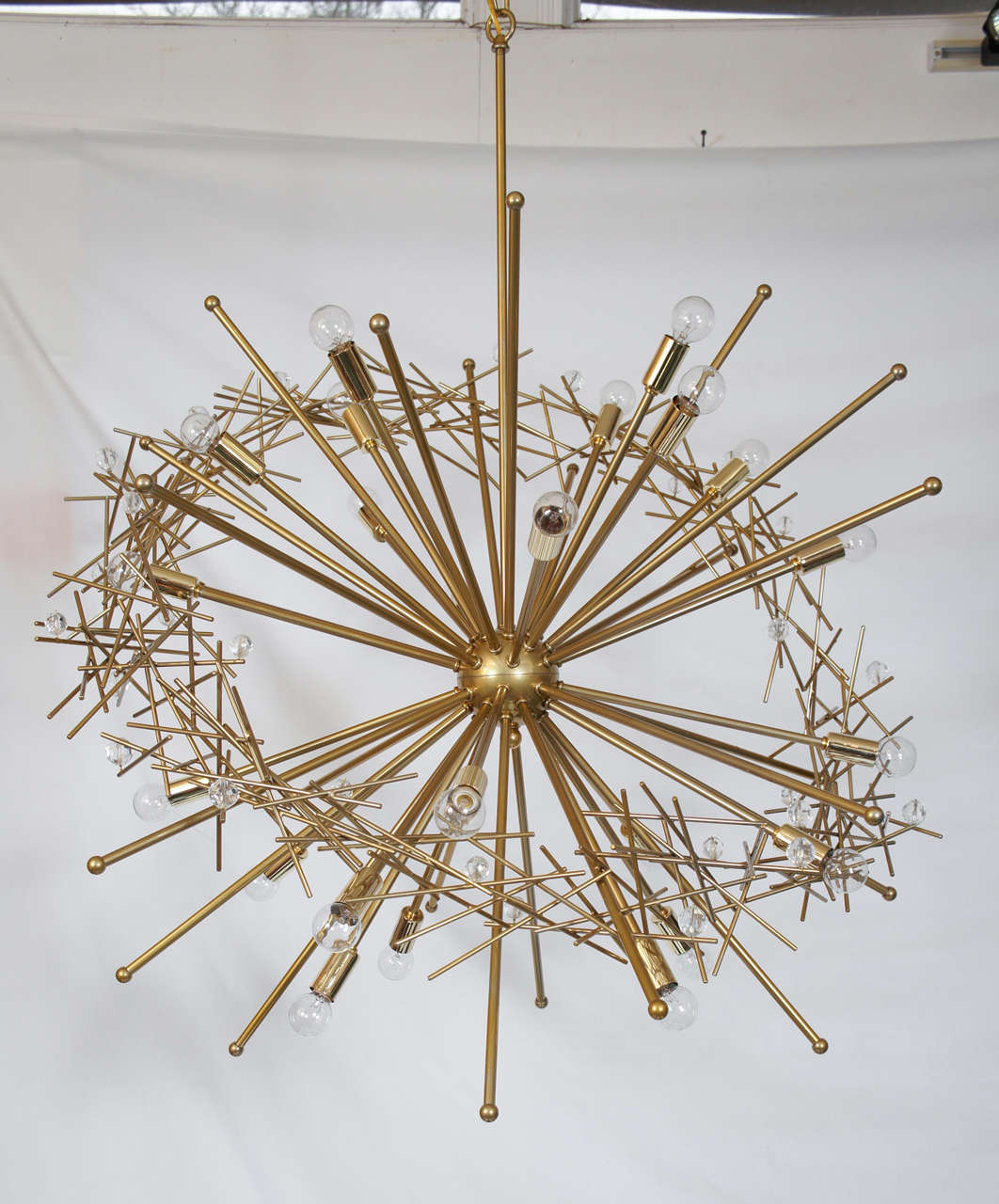 Powder-coated steel chandelier by Lou Blass with 24 lights. With crystal beads scattered throughout the ring. Hand-cut, shaped, and textured by acclaimed artist Lou Blass, then welded by the artist himself.
The entire collection of licensed Lou