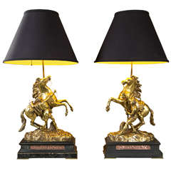 A Pair of Marley Horses signed G. Cousou