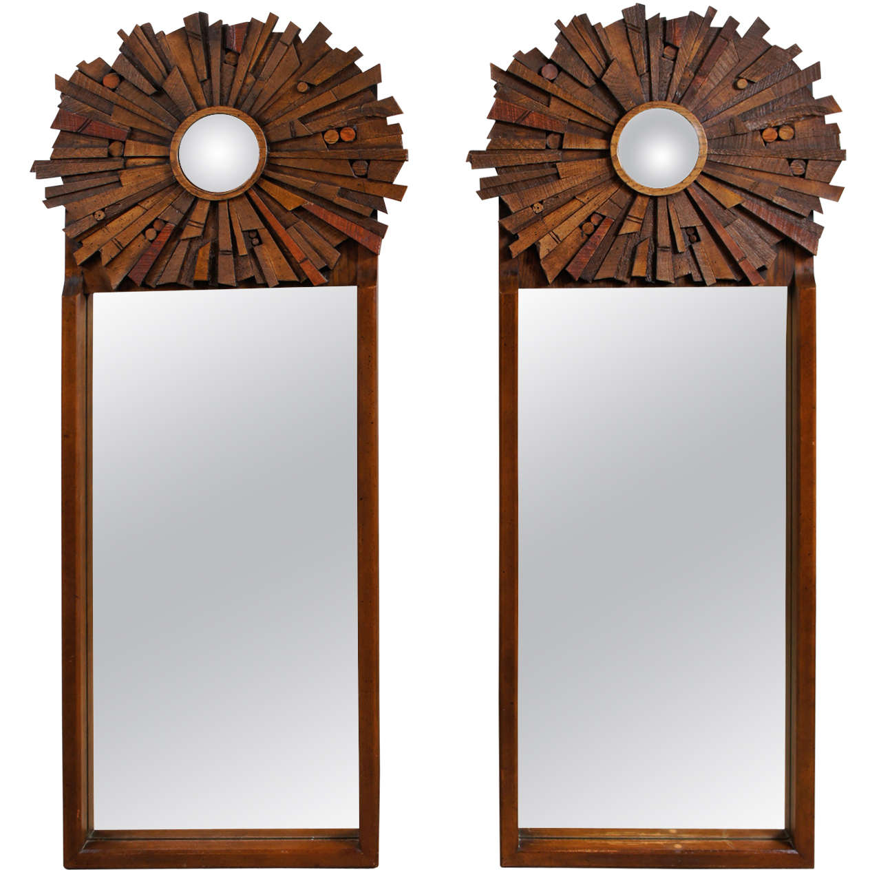 A Pair of Vertical Mirrors with Sunburst Medallions at 1stDibs
