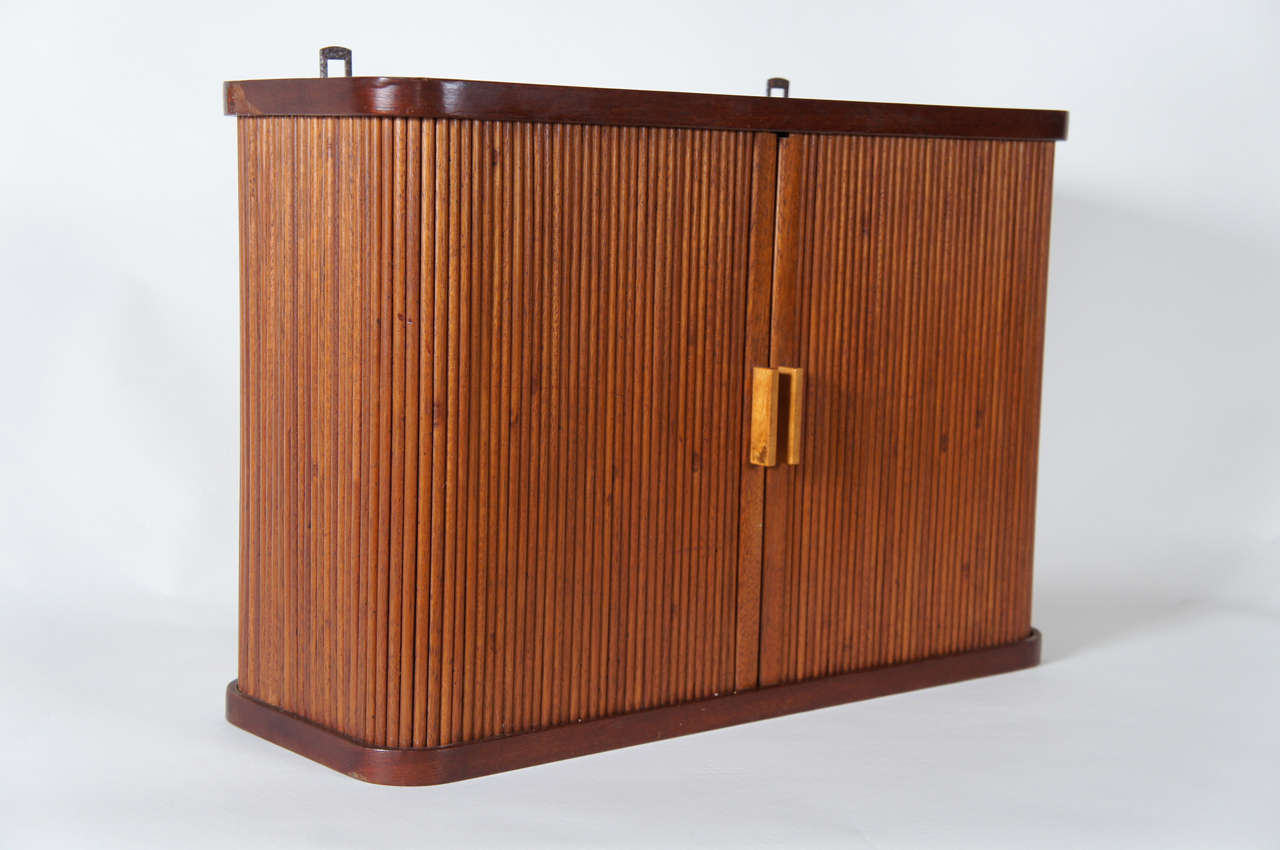 A Small Hanging Cabinet with Tambour Doors at 1stdibs