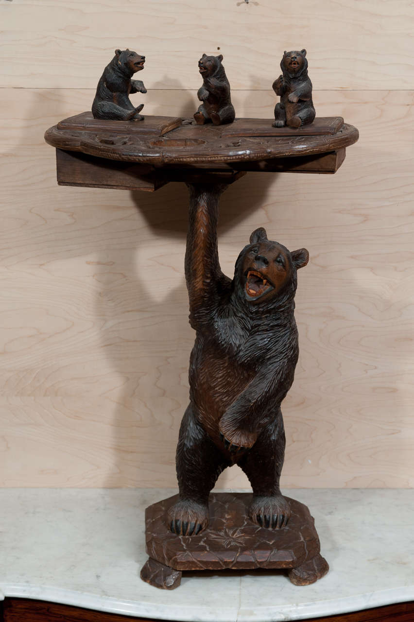 Whimsical bear-themed black forest smoking stand