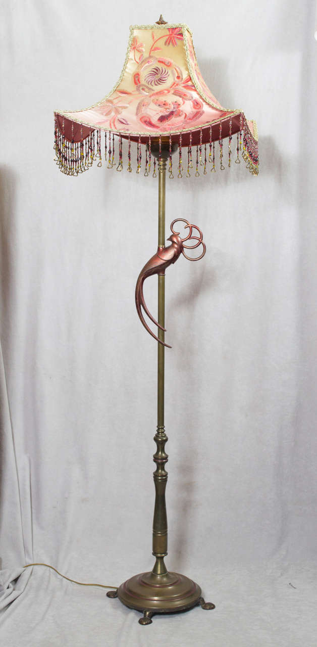 This wonderfully whimsical floor lamp is one we have not seen before.  This will bring a smile to your face and decorate a room at the same time.  Besides the fun bird, the shade is an exceptionally high quality piece of craftsmanship.  The shade is