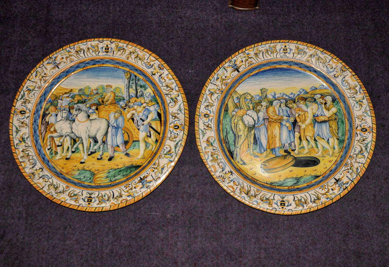 Pair of 19th Century ceramic plates. Cantagalli work with a biblical decor. Good condition. Normal wear consistent with age and use.