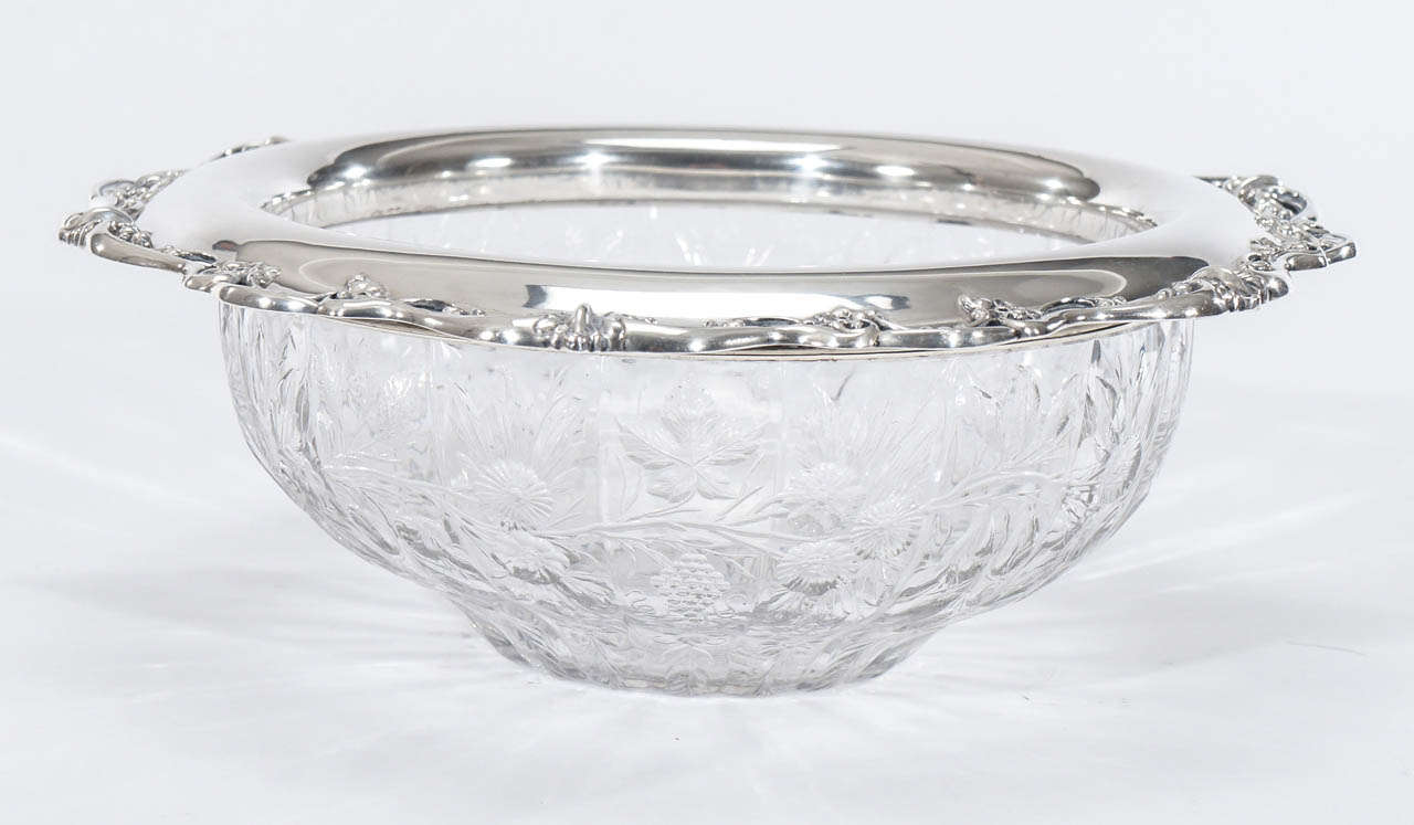 This is an exceptional example of Thomas Webb's masterful glass blowing and wheel cut decoration. This centerpiece is ribbed into 18 sections and has all-over cutting of wheel cut engraved floral decoration. The low profile is perfect for a