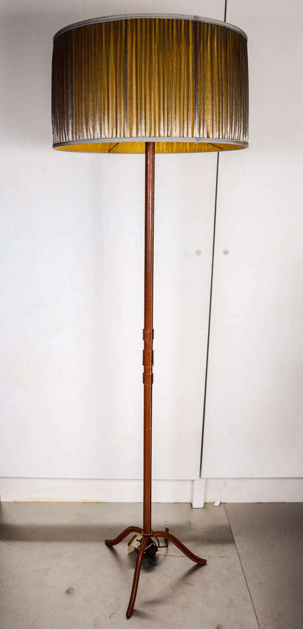 1950s stitched leather floor lamp.
Dimensions are provided without the shade.
The shade is not included.