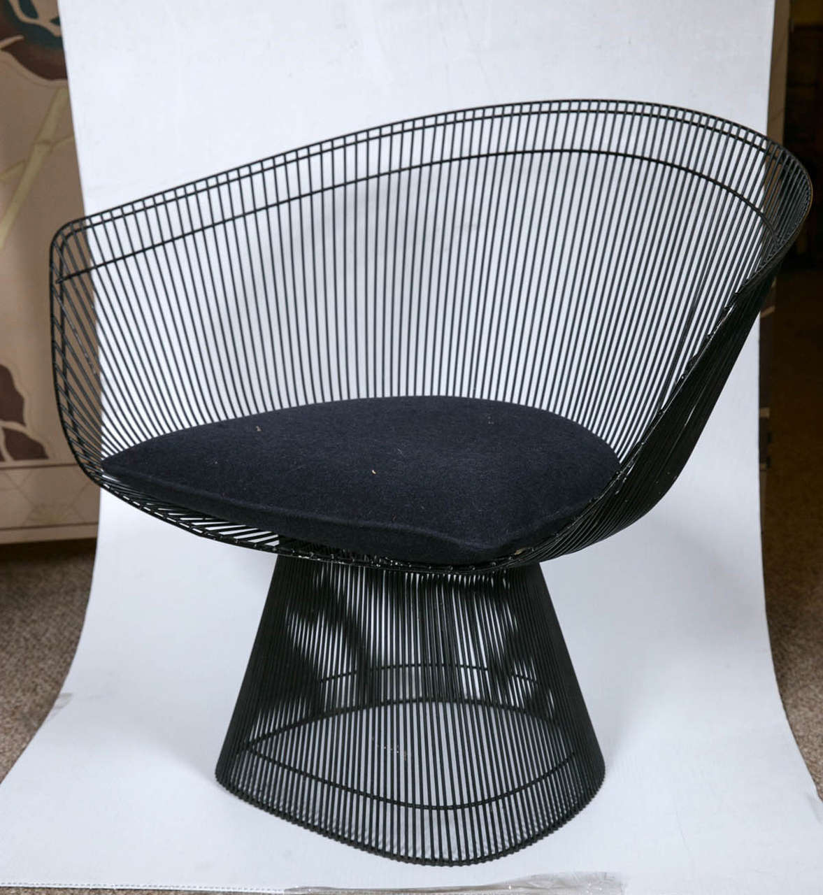 Midcentury Warren Platner lounge chair. This iconic Warren Platner lounge chair introduced by Knoll International in 1966; of nickel wire base and basket frame with upholstered seat.