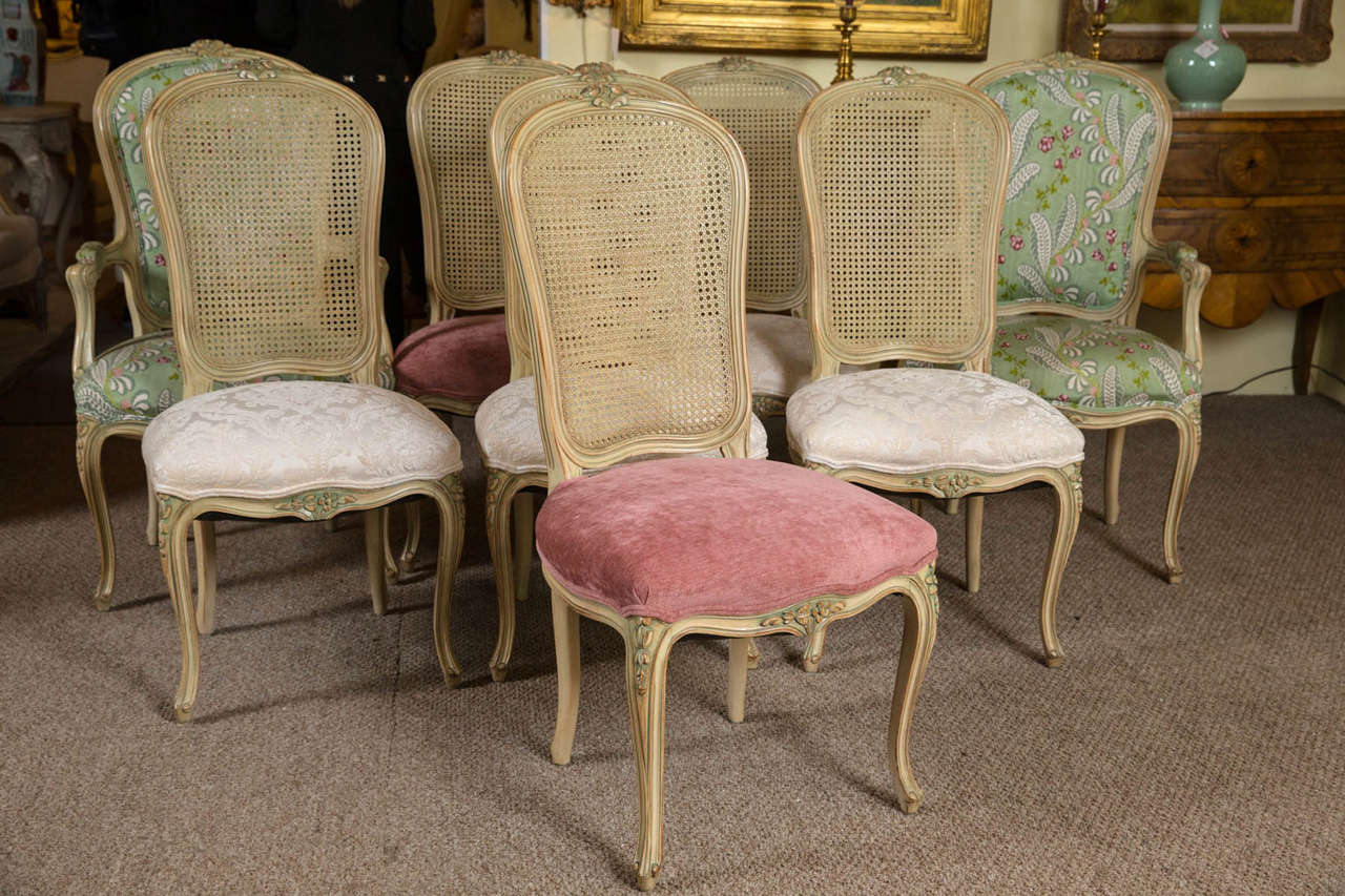 A fabulous set of eight dining chairs in the style of Louis XV, this fabulous set was used in the Chanel 2015 fashion show recently. Taken straight from our showroom. Delicately designed with gilt florats on top of the chairs and on the apron