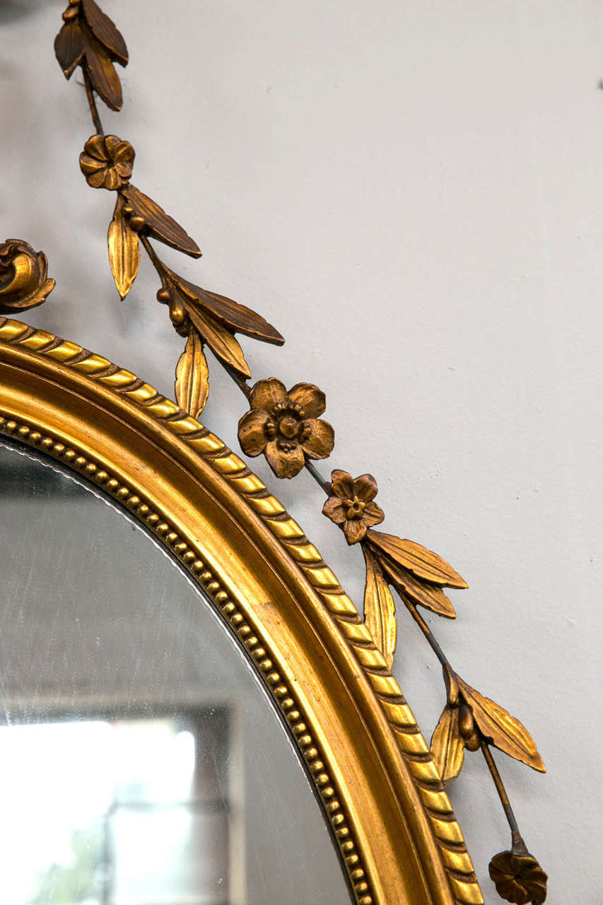 Giltwood and Gesso Carved Adams Style Mirror In Good Condition In Stamford, CT
