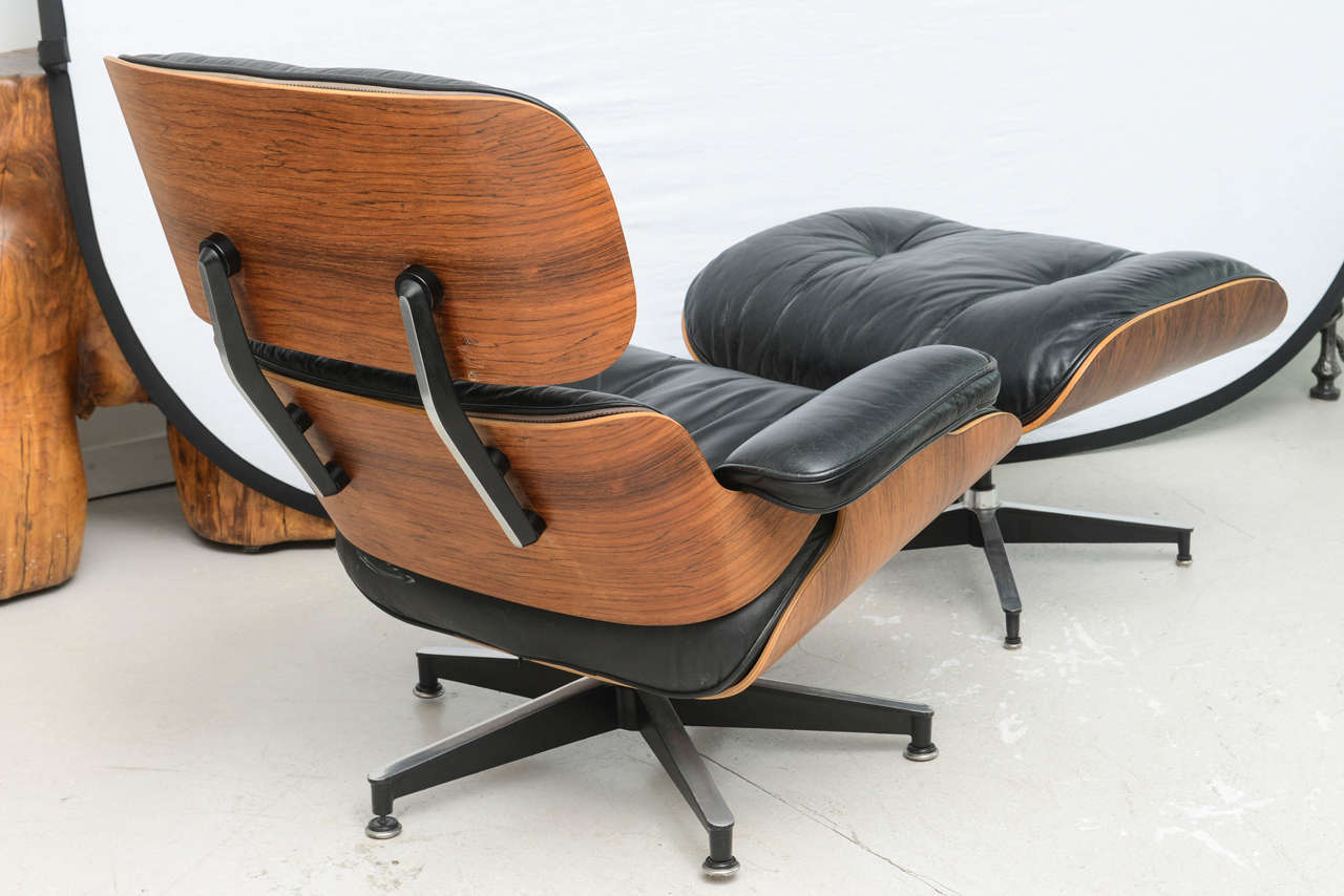 Mid-20th Century Two Vintage Eames Rosewood and Black Leather Lounge Chairs