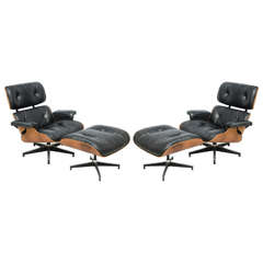 Two Vintage Eames Rosewood and Black Leather Lounge Chairs