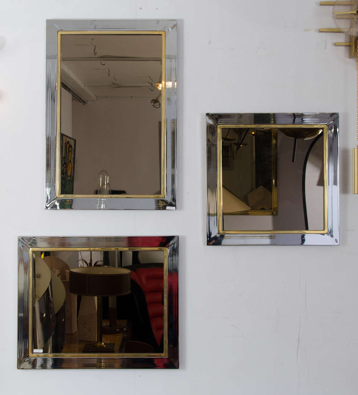 Chrome and brass edged mirrors with titanium colored glass.
All three come in the following three sizes.
Measurements: 45 X 64 cm.
55 X 64 cm.
45 X 45 cm.