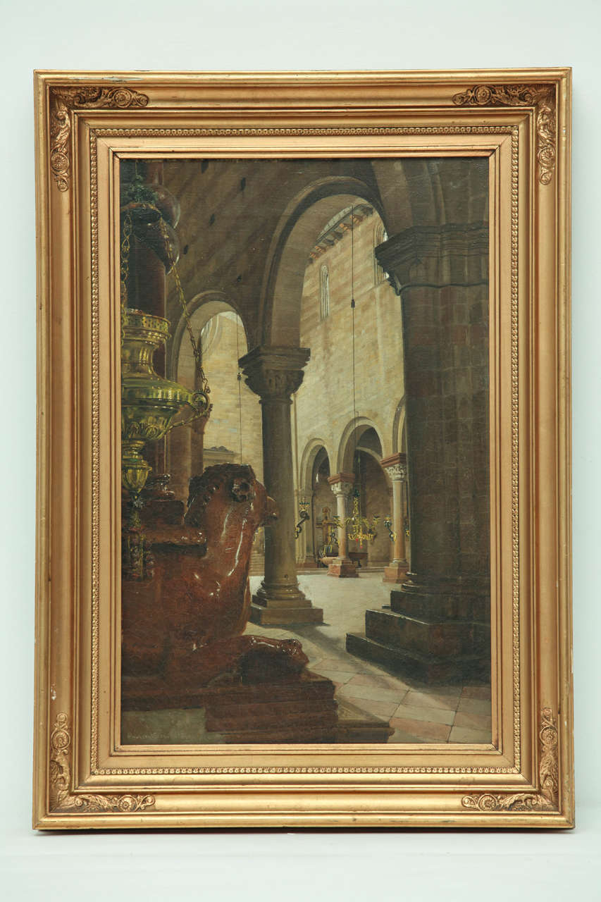 The painting is signed 'J. t. Hansen Verona'.
Joseph Theodore Hansen was a Danish artist (1848 - 1912). He was a fine Grand Tour painter, and travelled around Europe and especially in Spain, Greece and Italy. Fascinated by church interiors and