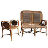 A two piece set of rattan furniture