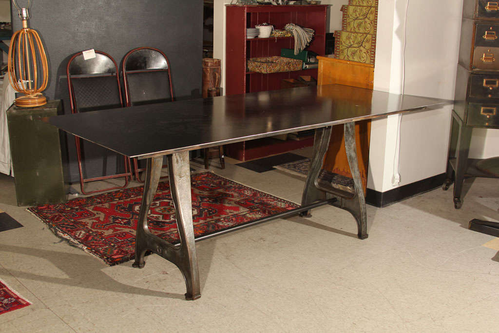 Made to order, finished steel dining table with industrial machine legs.  Contact Dealer for specific dimensions, and details.