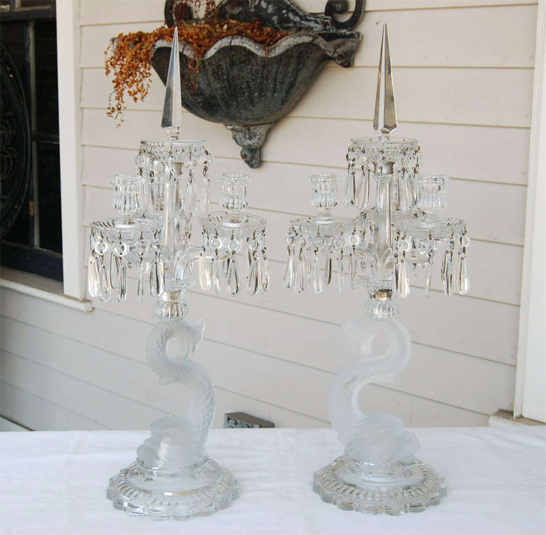 This fine vintage pair of Baccarat candelabra marked with the makers acid etched mark is in a late 19th century style. Made from the mid 19th century thru the 30's this was one of the company's most popular forms and shows the fine attention to