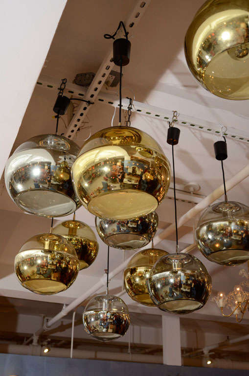 German Stunning Group of Silver and Gold Hanging Ball Chandeliers