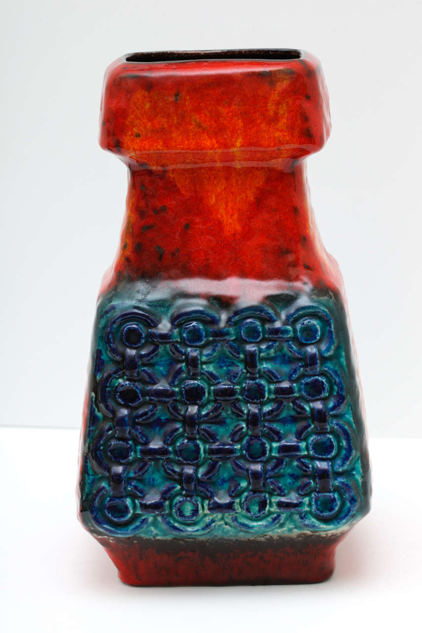 This West German art vase by Bay Keramik has a beautiful glaze in shades of red, turquoise and blue. Large in size, standing 10.25
