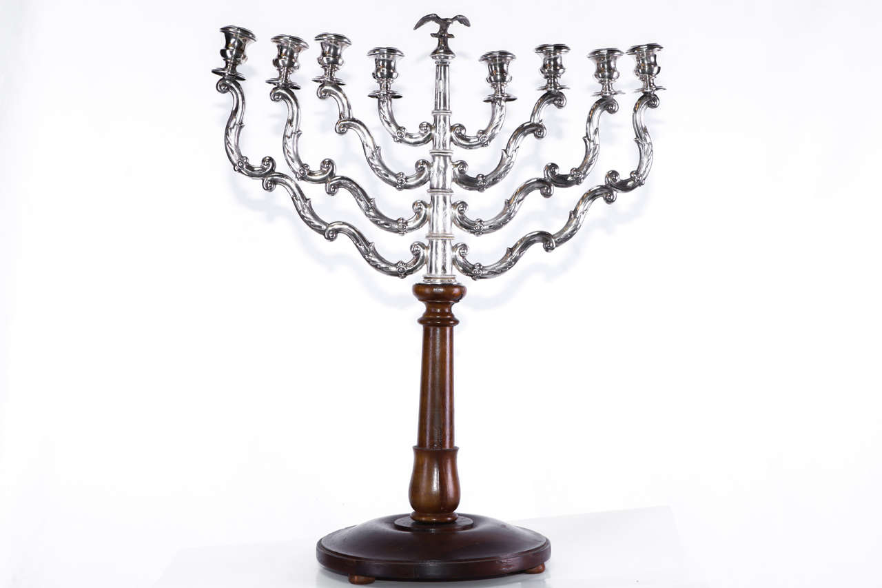 Rare 18th century Austrian silver candelabra with a removable eagle on the top and a later wooden base.
Punched on every arms 