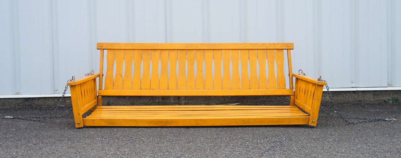 Mission Oak porch swing in yellow paint. Taken right off the porch from a great old Arts and Crafts home. Spend your summer eves swinging gently with the breeze.