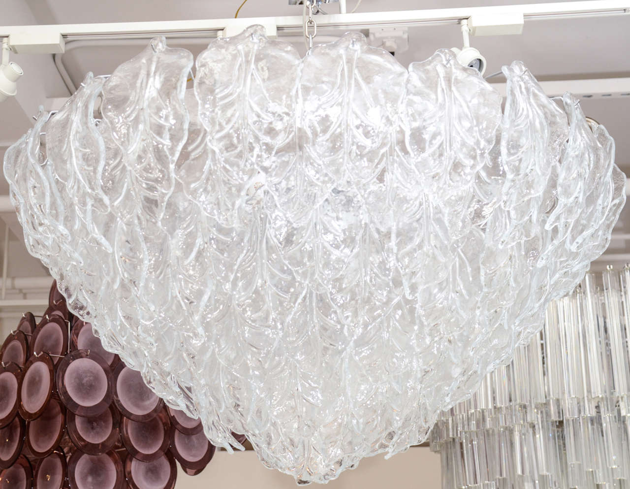 This magnificent Italian Murano chandelier consists of over 100 individual glass 