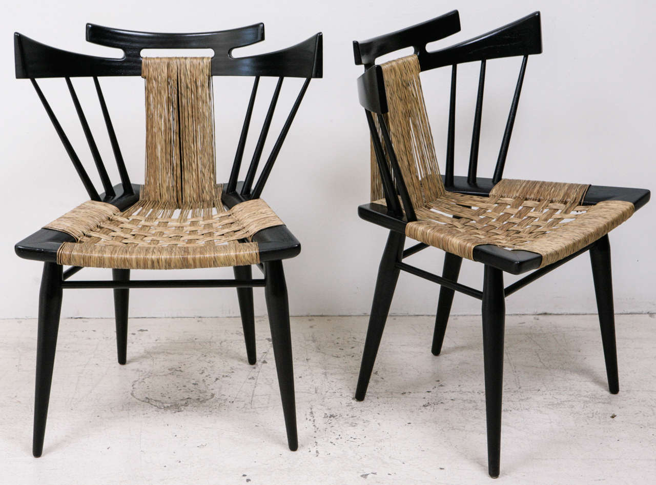 Rare sculptural spindle-back Edmund Spence side chairs for Industria Muelblera S.A. Mexico.   Mahogany frames and woven sea grass seats.  