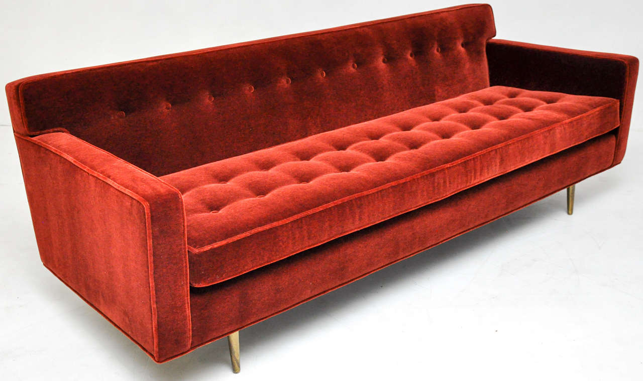 Sofa designed by Edward Wormley for Dunbar.  Newly upholstered in mohair.  Heavy solid brass legs with nice patina.

**Color of mohair is a deeper red than it shows in photos, due to flash.  Blood red mohair.