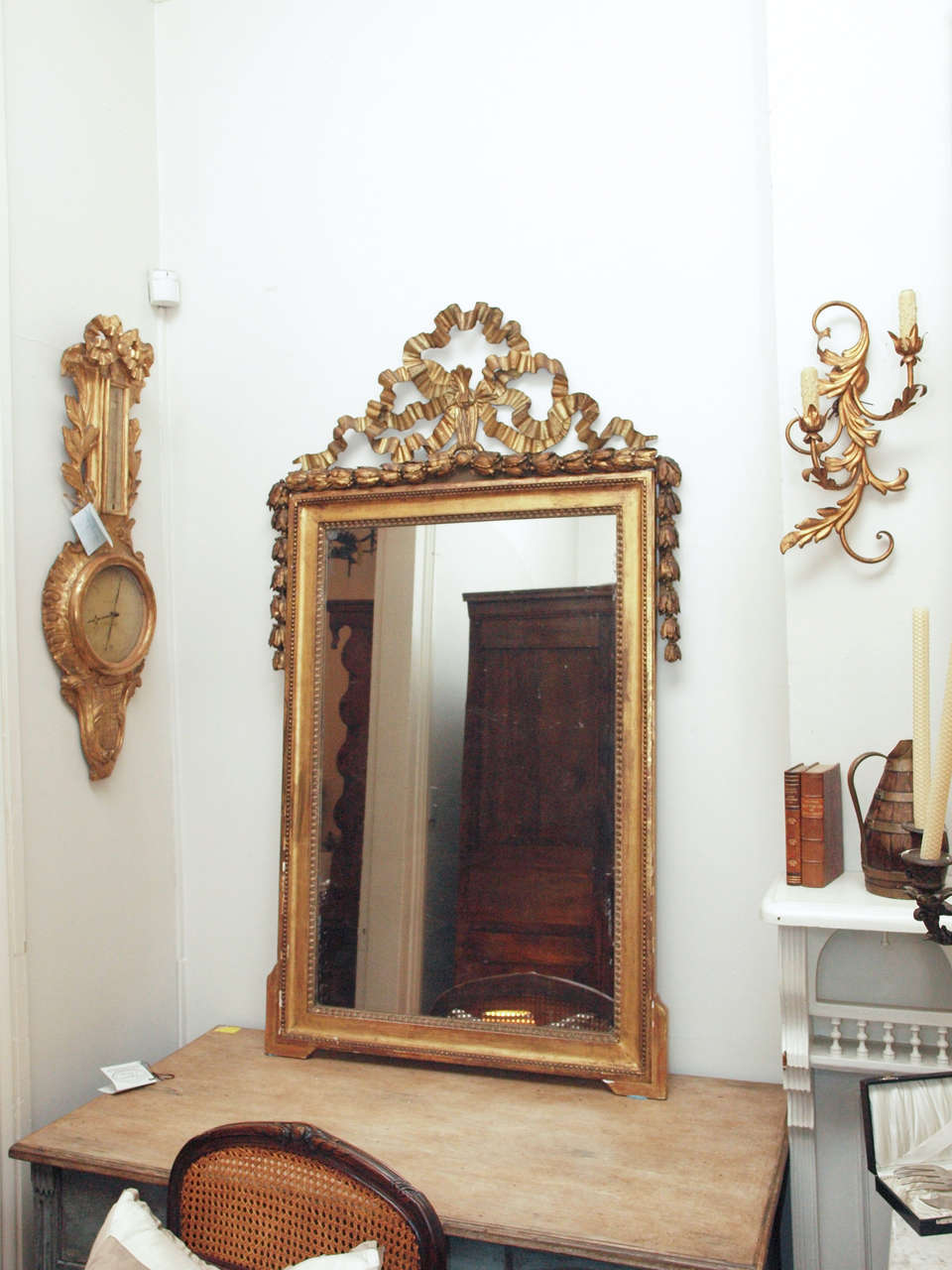 18th Century Giltwood Louis XVI Mirror with carved bow design