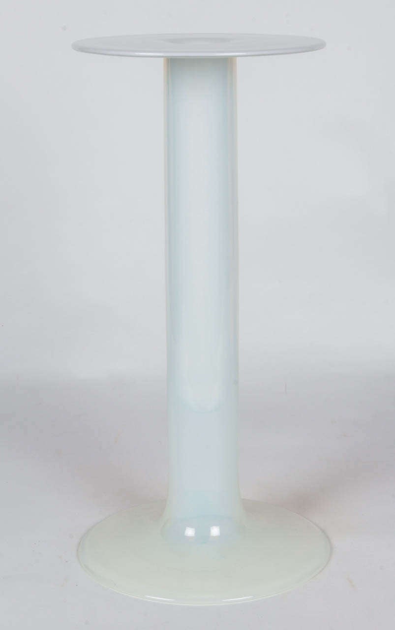 AV MAZZEGA MURANO (Italy)

Vase  c. 1975

White opalescent blue blown glass with a bottom tube support and a flared 
test tube style top

For related information see:  Italian Glass Murano Milan 1930-1970, Helmut  Ricke and Eva Schmitt