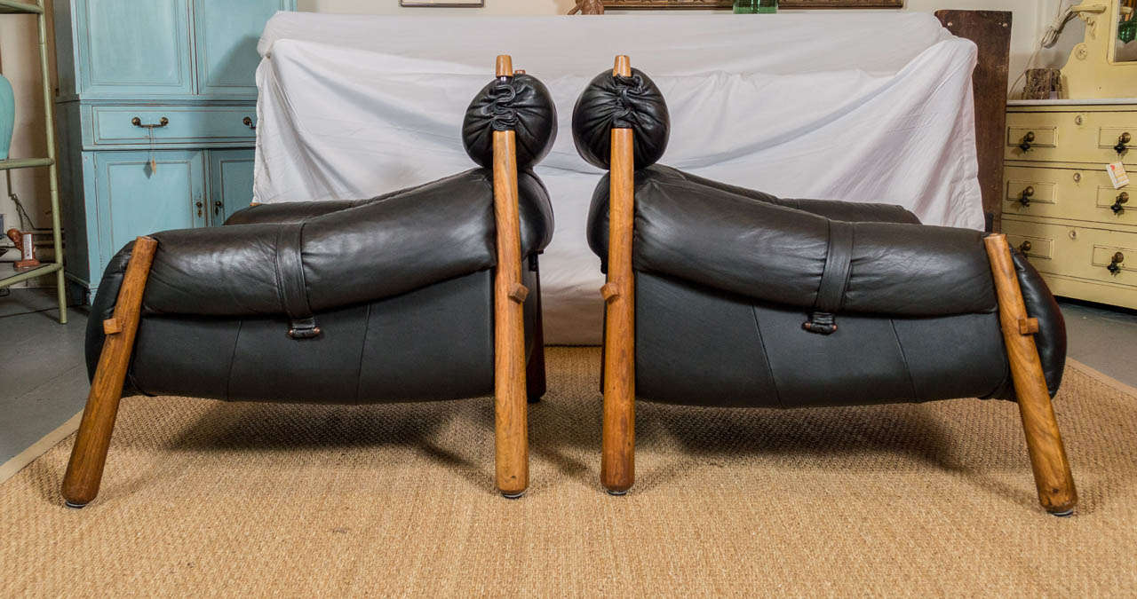 Mid-20th Century Pair of Black Leather and Rosewood Lounge Chairs with Ottoman by Percival Lafer