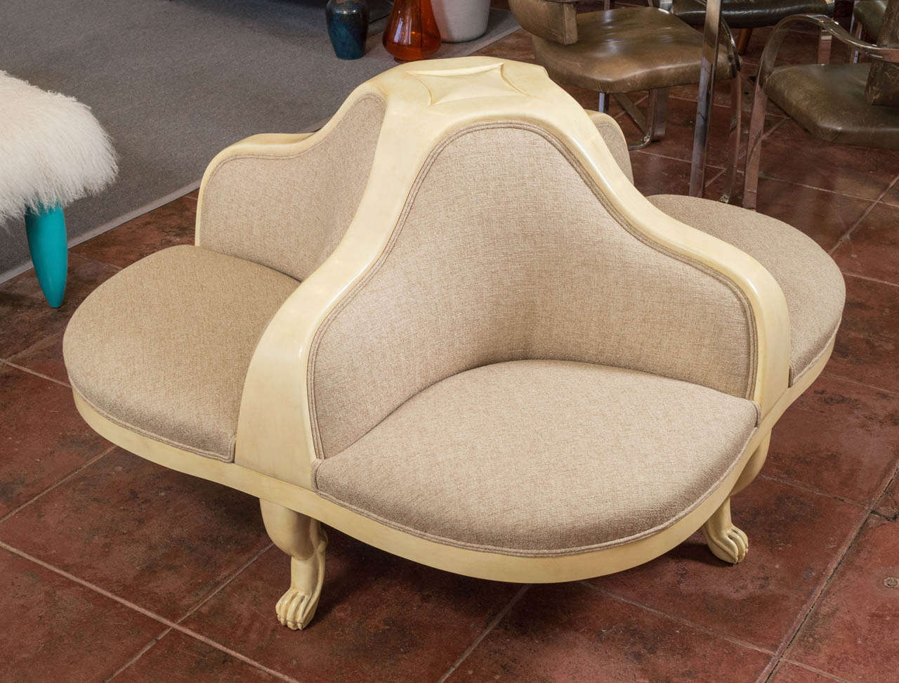 This style of seating originated in France, in the 1850's, this one is from circa 1930's. It's been restored, refinished and reupholstered, with the frame in a Yellowy cream and the upholstery a light tan. Nice details from the claw foot legs, to
