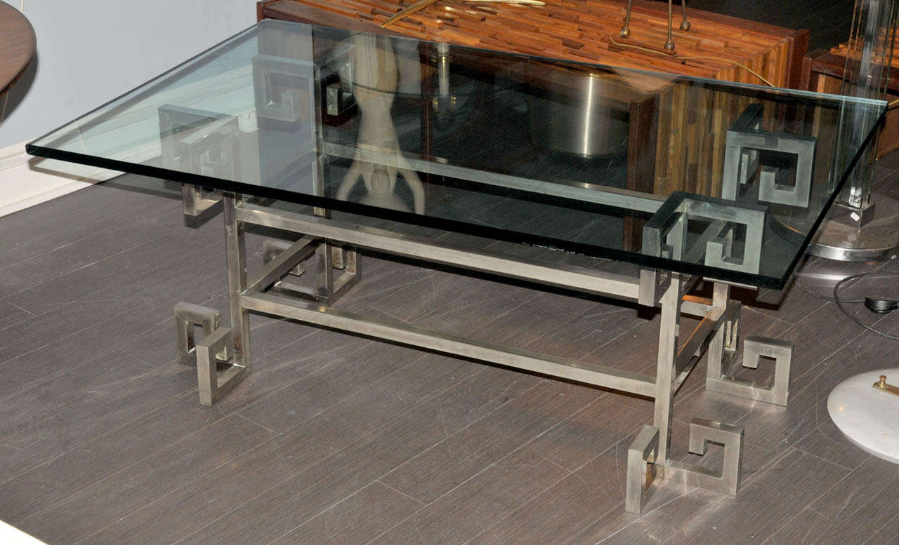 1970's coffee table in nickel plated steel with a glass top. Good condition. Normal wear consistent with age and use.