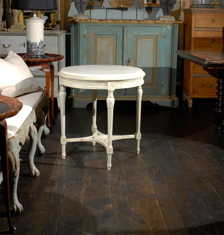A Swedish Gustavian Style Round Table with Marble Top.
Custom Paint