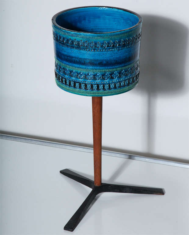 Architectural Plant Stand with incised design in classic Aldo Londi Mediterranean  Blue with Green hues on Teak stand and Iron tripod base distributed by Rosenthal Netter