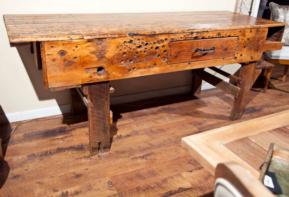 Industrial work bench, c. 1900-20, with an oak top and a pine one drawer apron, obviously used by a cabinet-maker.