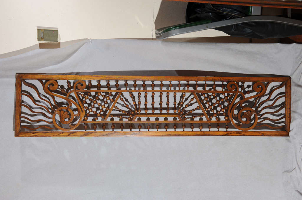 This is a very nice example of Victorian architectural fretwork.  These were used as room dividers and were particularly popular from the 1880s through the turn of the century.  This one is oak, which is the most highly sought after choice of wood. 