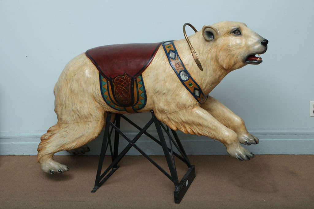 An early 20th century carousel polar bear in carved and painted wood by Bernard van Guyse, Belgium, from the famous Noah's ark carousel.  This polar bear is a remarkable example of Bernard van Guyse's wood-carving talents.  A trained sculptor, van