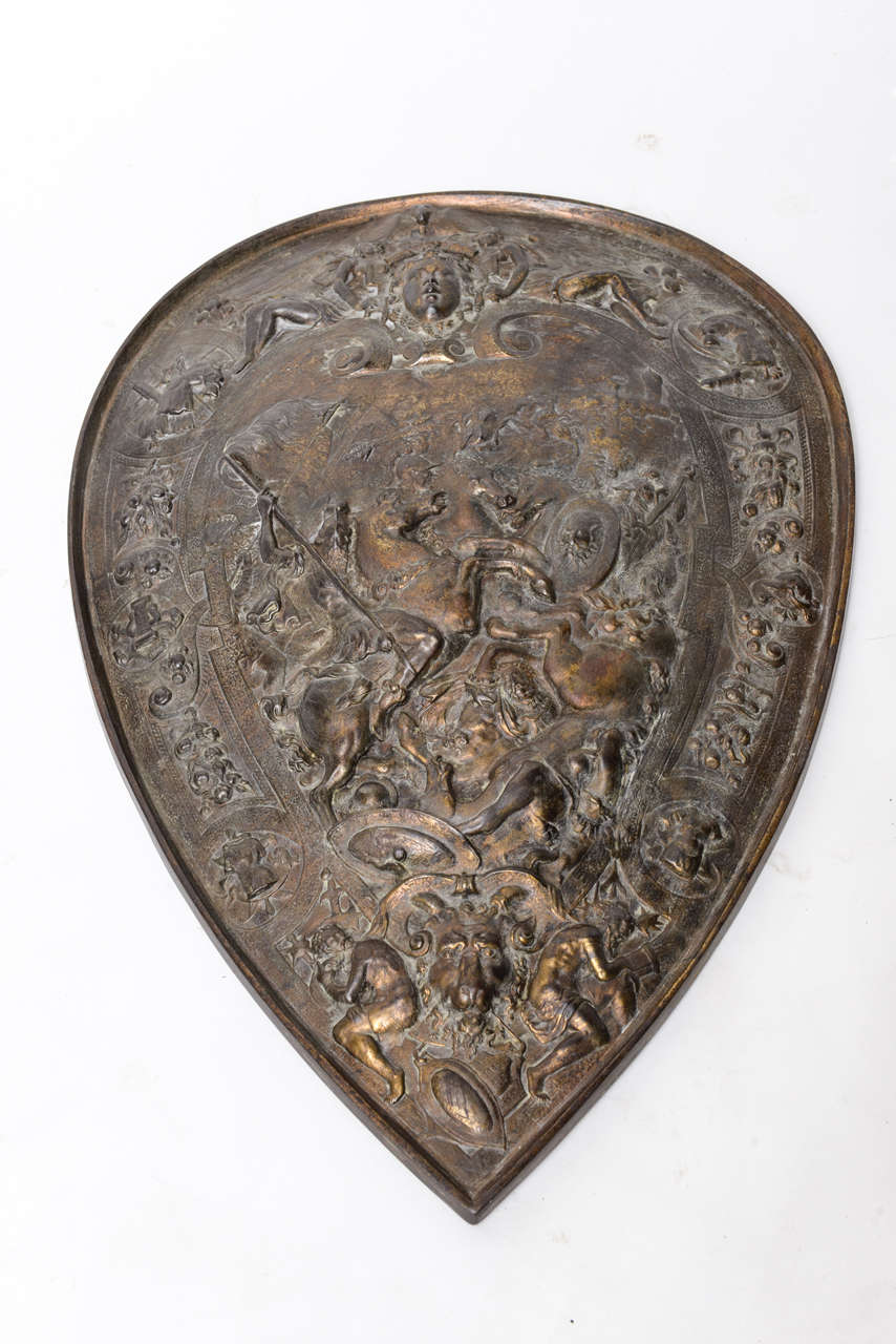 Beautifully chased bronze European shield, done with great detail.