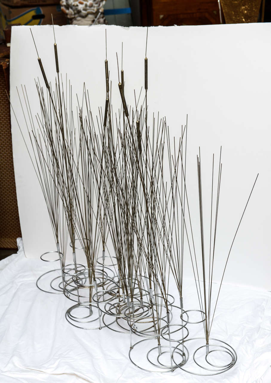 Unusual Curtis Jere wall sculpture of cattails in water. Also very effective table centerpiece.