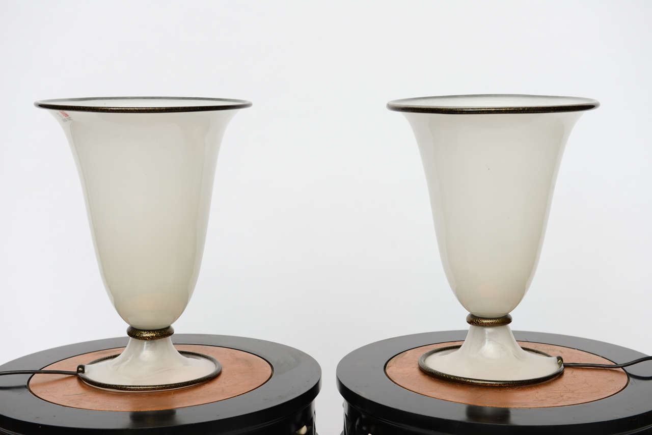 Circa 1970's Mid Century Modern White Hand-Blown Murano Glass Urn Shaped Table Lamps by Barovier e Toso, Italy's Premier and Oldest Glass Maker-true collector pieces. In the Style and era of iconic designer Karl Springer….Exquisitely detailed